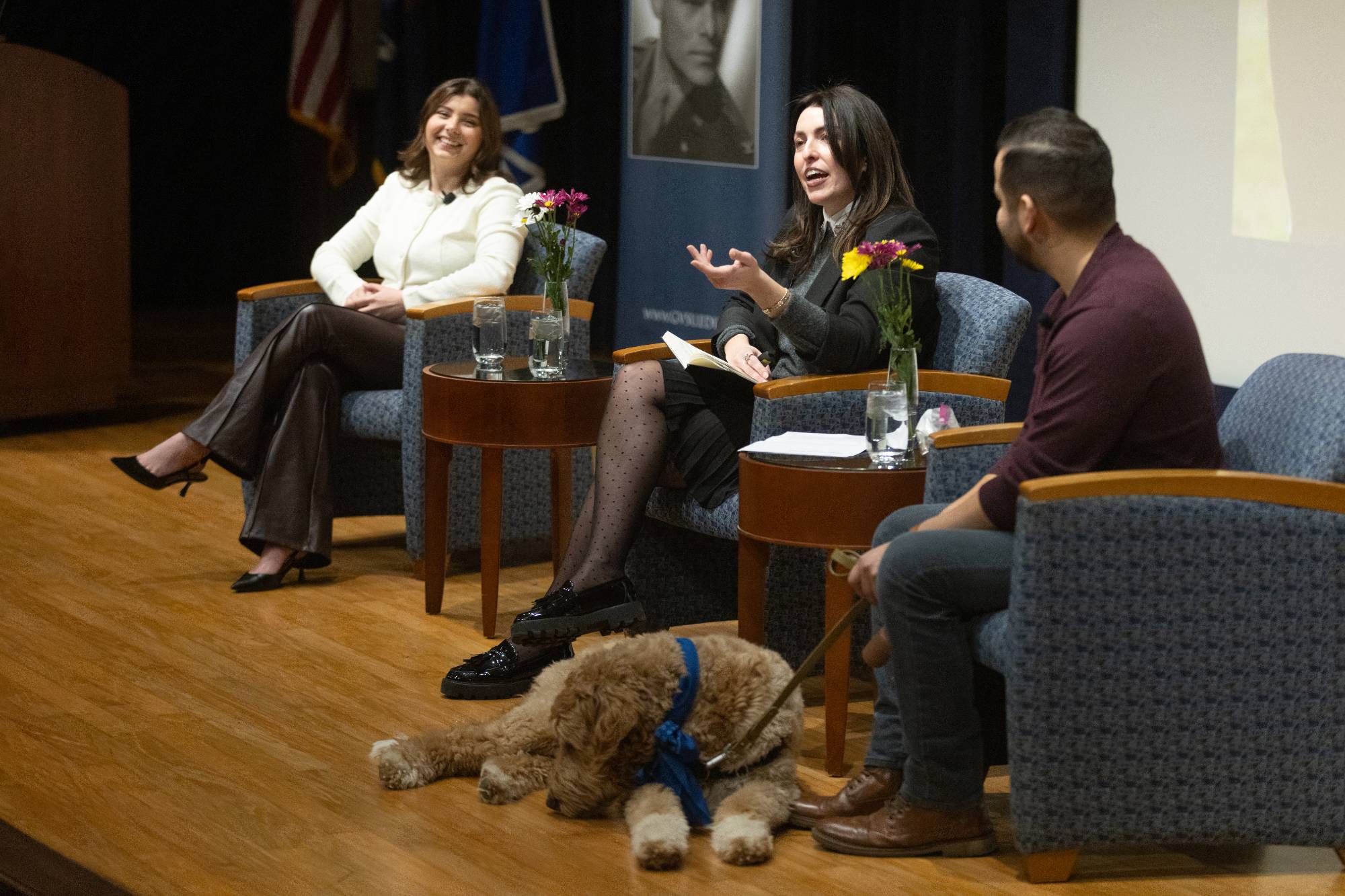 person speaking at a podium